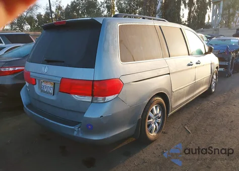 2010 Honda Odyssey Ex z USA, uszkodzony, nr VIN 5FNRL3H47AB020272